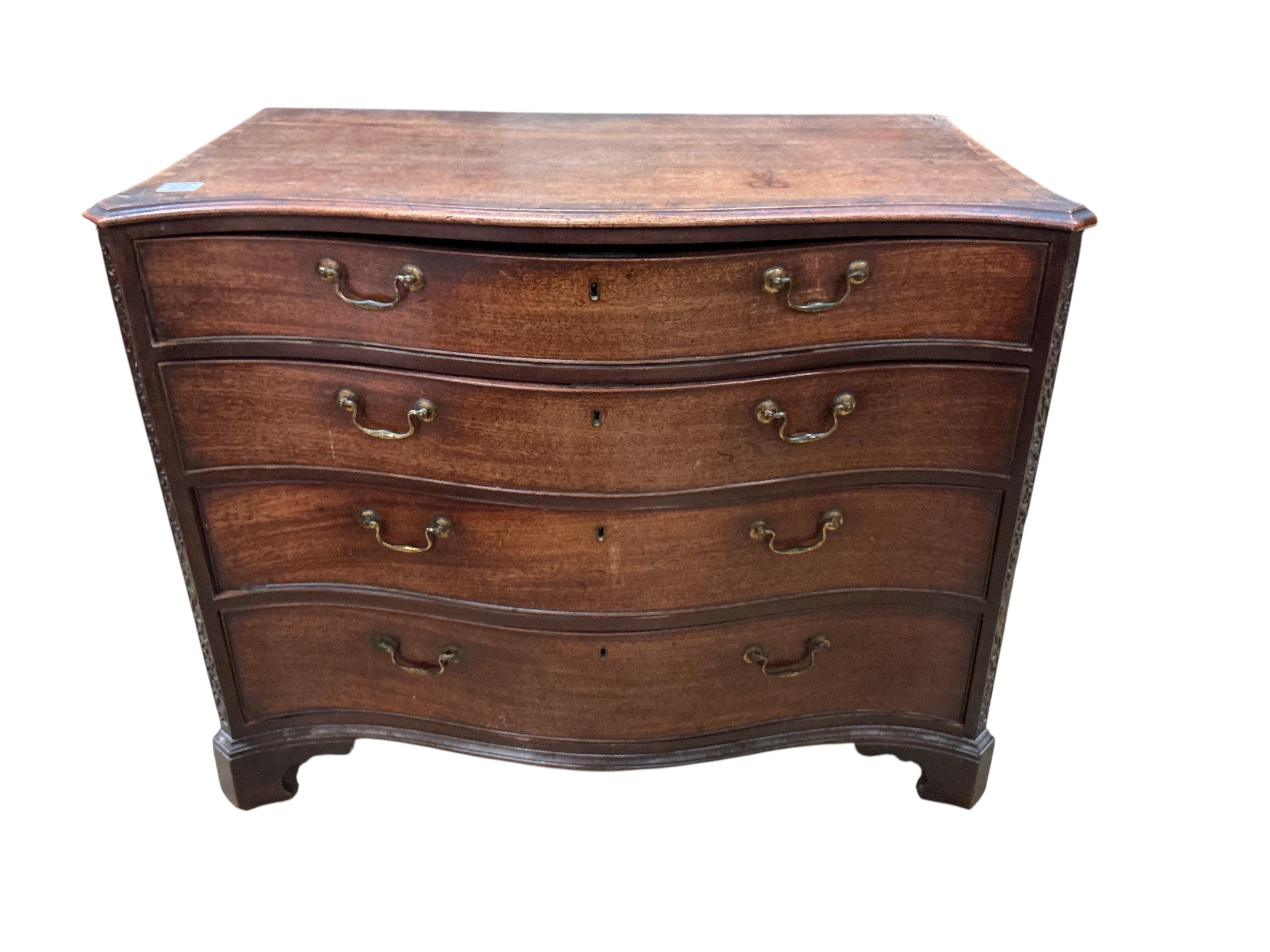 A George III mahogany serpentine chest of four drawers, width 105cm, depth 59cm, height 82cm
